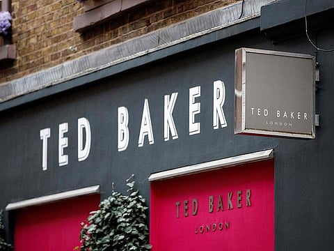 In this file photo taken on December 10, 2019 a sign is pictured outside a Ted Baker clothing store in London. -