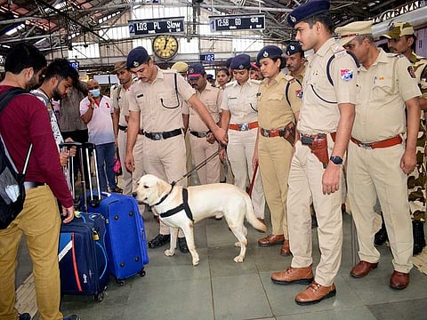 Government Railway Police (GRP), Railway Protection Force (RPF) personnel and dog squad inspect a luggage at the Chhatrapati Shivaji Maharaj Terminus (CSMT), in Mumbai on Saturday, August 20, 2022. 
