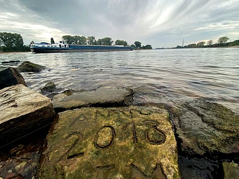 One of the 'hunger stones' is revealed by the low level of water in Worms, Germany, August 17, 2022.