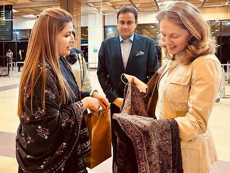 Federal Minister for Poverty Alleviation and Social Safety, Shazia Marri, presents traditional Sindhi shawl Ajrak as gift to visiting Princess Sarah Zeid of Jordan.