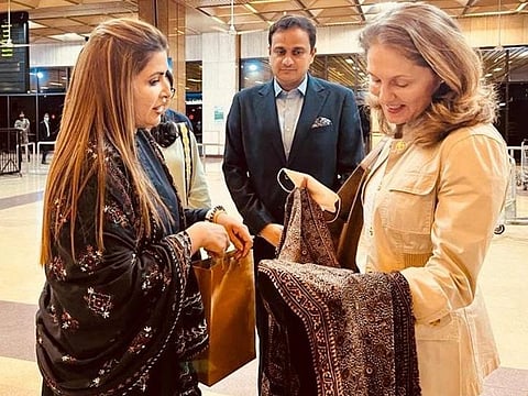 Federal Minister for Poverty Alleviation and Social Safety, Shazia Marri, presents traditional Sindhi shawl Ajrak as gift to visiting Princess Sarah Zeid of Jordan.