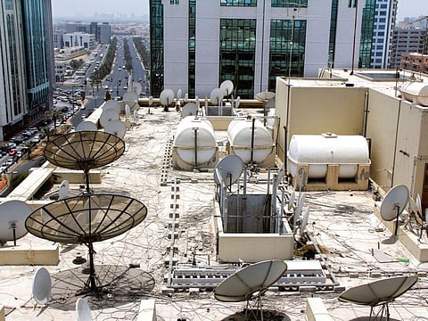 Crowding of rooftop satellite dishes are an eyesore and potential hazard, authorities say 