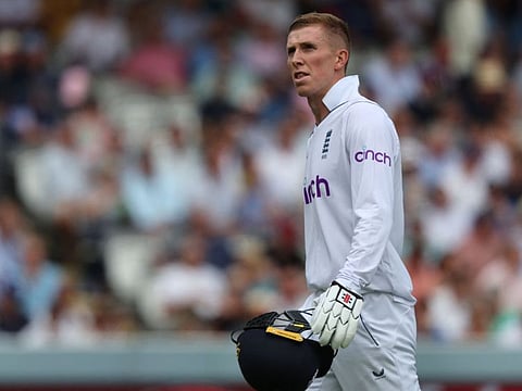 England's Zak Crawley walks off the ground after losing his wicket on day 3 of the first Test match between England and South Africa at the Lord's cricket ground in London.