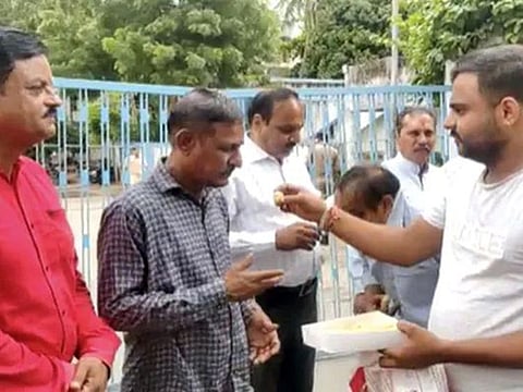 The convicts in Bilkis Bano case being offered sweets after their release