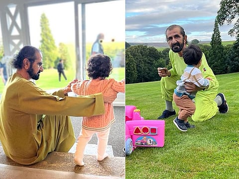Sheikh Hamdan shares photographs of Sheikh Mohammed playing with his grandchildren in England