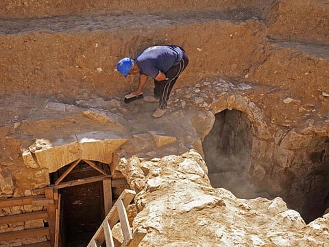Staff of Israel's Antiquities Authority work at a newly-uncovered mansion dating back to the early Islamic period between the eighth and ninth centuries, in the Bedouin town of Rahat in Israel's southern Negev desert on August 23, 2022.  