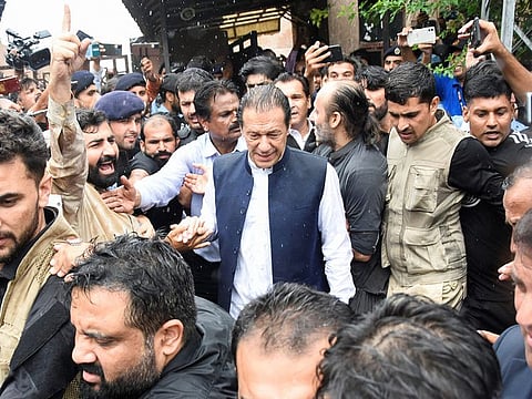  Pakistan’s former Prime Minister, Imran Khan, who is facing terrorism charges, leaveing the court in Islamabad, on August 25, 2022. 