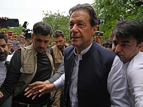  Pakistan’s former Prime Minister, Imran Khan, who is facing terrorism charges, leaveing the court in Islamabad, on August 25, 2022. 