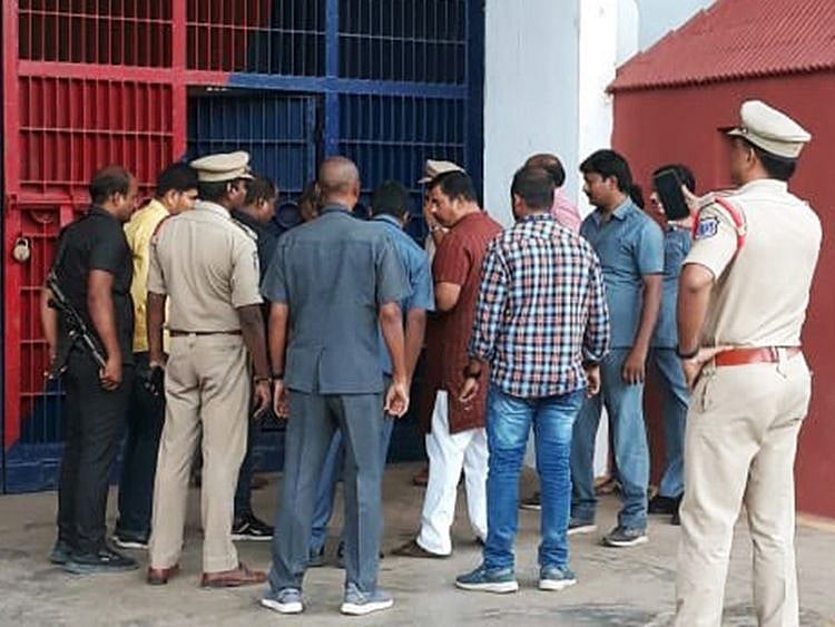 T Raja Singh (in red and white) brought to Cherlapalli Central Jail after being arrested by Telangana Police in Hyderabad on Thursday.