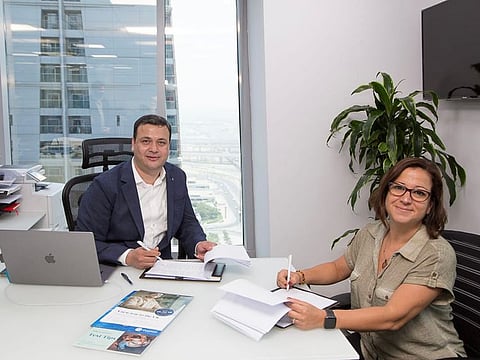  Clint Khan, Director of Y-Axis Middle East DMCC, with Ipek Aydin, Head of PTE for the Middle East & North Africa
