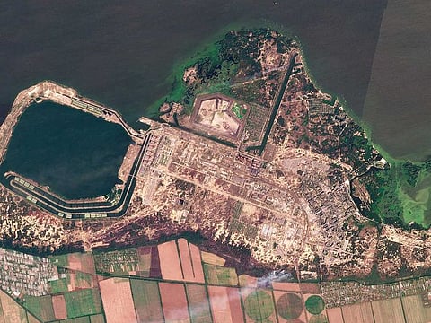 This composite of satellite images taken by Planet Labs PBC shows smoke rising from fires at the Zaporizhzhia nuclear power plant in southeastern Ukraine on Thursday, Aug. 25, 2022. 