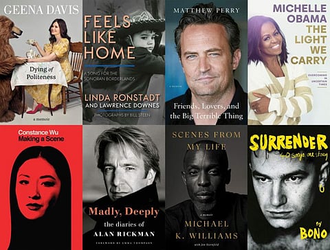 This combination of cover images shows upcoming celebrity books, top row from left, "Dying of Politeness," by Geena Davis, "Feels Like Home: A Song for the Sonoran Borderlands" by Linda Ronstadt and Lawrence Downes, "Friends, Lovers, and the Big Terrible Thing" by Matthew Perry, "The Light We Carry" by Michelle Obama, "Making a Scene" by Constance Wu,  "Madly, Deepply" by Alan Rickman, "Scenes from My Life" by Michael K. Williams with Jon Sternfeld and "Surrender: 40 Songs, One Story" by Bono. 