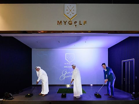 Saeed Mohammed Hareb, Secretary-General, Dubai Sports Council (centre), Michael Zhao, CEO and founder of MyGolf Dubai (right) and Mubarak Bin Fahad, during the MyGolf Dubai Official Grand Opening at Dragon Mart 2, Dubai. 