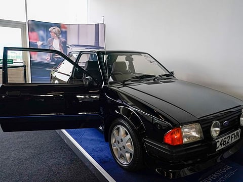 The Ford Escort RS Turbo Series 1, that belonged to the late Diana, Princess of Wales, is seen during a preview of an auction at Silverstone circuit, in Northamptonshire, England, Friday, Aug. 26, 2022.