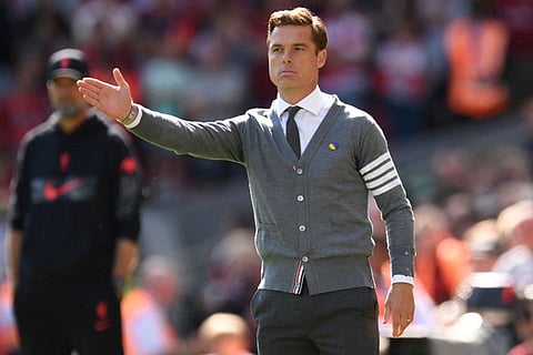 Bournemouth's coach Scott Parker gestures on the touchline during the English Premier League football match against Liverpool at Anfield in Liverpool, north west England.