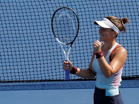 Bianca Andreescu celebrates after her match against Harmony Tan