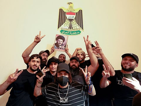 Supporters of Iraqi populist leader Moqtada al-Sadr protest at the Green Zone, in Baghdad, Iraq August 29, 2022. 