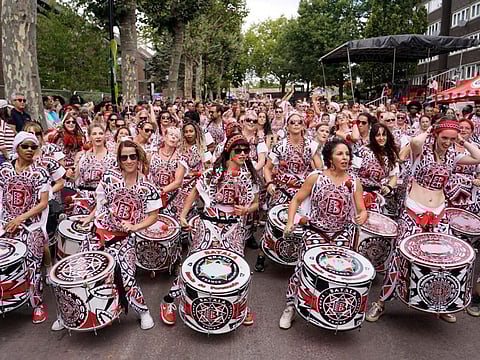 Performers take part in the annual Notting Hill Carnival in west London, Monday, Aug. 29, 2022.