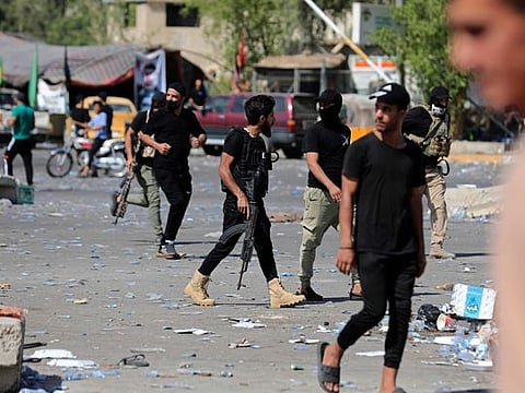 Fighters from the Saraya Salam (Peace Brigades) loyal to influential Shiite Iraqi cleric Muqtada Sadr deploy in Baghdad.