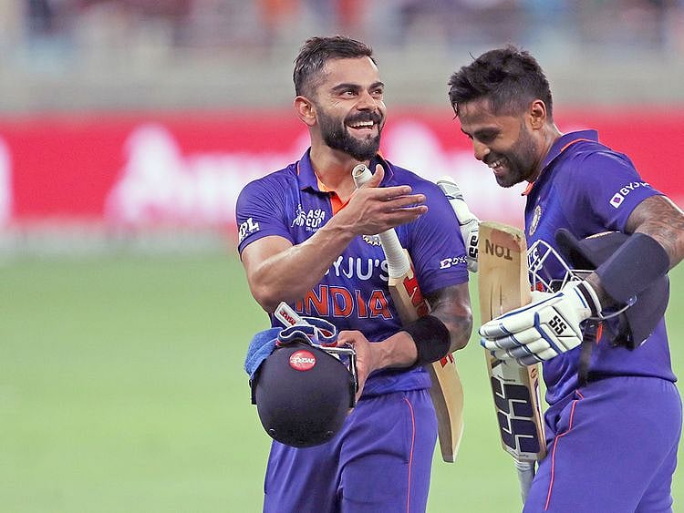 India's Virat Kohli and Suryakumar Yadav leave the field after their innings during the Asia Cup 2022 Group A match with Hongkong, at Dubai International Cricket Stadium in Dubai on Wednesday.