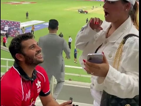 Hong Kong left-hander Kinchit Shah proposes to his girlfriend after India match at the Dubai International Stadium on Wednesday.