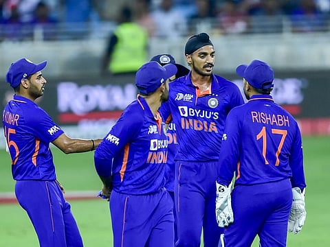Arshdeep Singh of India celebrates after taking the wicket of Yasim Murtaza of Hong Kong during the Group 'A' match of the DP World Asia Cup 2022 at the Dubai International Stadium on Wednesday.