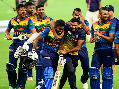 Sri Lankan players celebrate their thrilling win over Bangladesh in the DP World Asia Cup match at Dubai International Cricket Stadium on September 1, 2022.  
