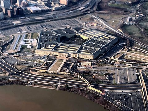 The Pentagon is seen in this aerial view made through an airplane window in Washington. The Pentagon releases a report every year on the number of sexual assaults reported by or about troops.