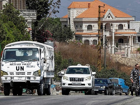 Vehicles of the United Nations Interim Force in Lebanon (Unifil) drive in the southern Lebanese border village of Adaisseh on August 30, 2022.  