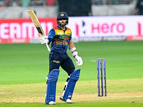 Kusal Mendis celebrates after completing his half-century against Bangladesh at Dubai International Stadium on Thursday.