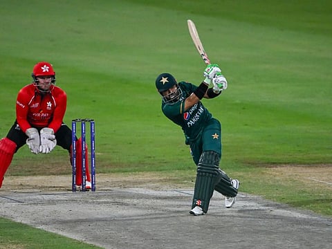 Pakistan opener Mohammad Rizwan hits a six against Hong Kong  during  their Asia Cup match at Sharjah Cricket stadium. 