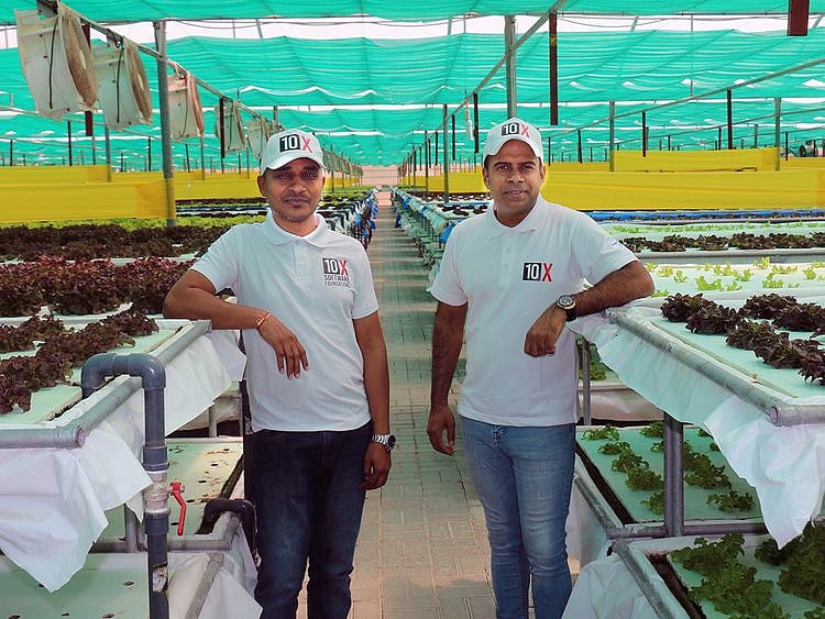 Sukesh Govindan (right), CEO of Tenx Software Foundations, and Madhuker Ganji, CTO of Tenx Software Foundations at client Armela Farms’ facility
