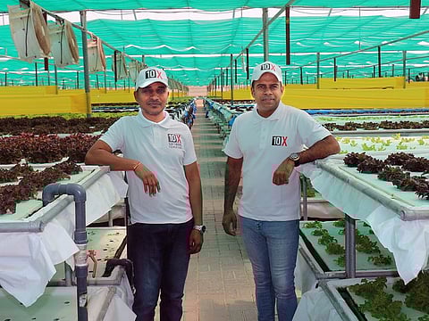 Sukesh Govindan (right), CEO of Tenx Software Foundations, and Madhuker Ganji, CTO of Tenx Software Foundations at client Armela Farms’ facility