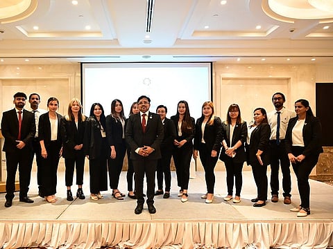 Aurion Founder and Managing Director, Syam P. Prabhu with the team at the event