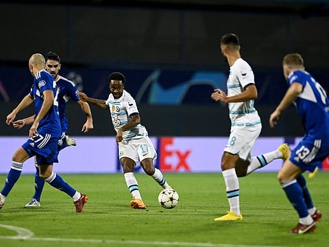 Chelsea's forward Raheem Sterling (centre) passes the ball during the UEFA Champions League Group E match against Dinamo Zagreb at The Maksimir Stadium in Zagreb.