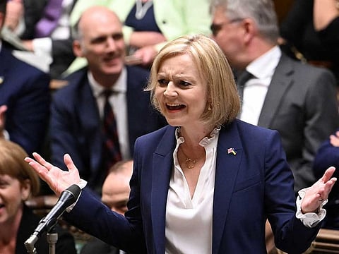 A handout photograph released by the UK Parliament shows Britain's Prime Minister Liz Truss gesturing and speaking during her first weekly Prime Minister's Questions (PMQs) session at the House of Commons, in London, on September 7, 2022. 