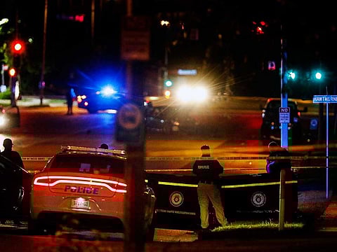 Memphis Police officers work an active shooter scene on Poplar Avenue in Memphis, Tenn. Wednesday, Sept. 7, 2022.  