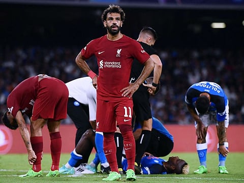 Liverpool's Egyptian forward Mohamed Salah (centre)  after losing the Champions League opener against Napoli at the Diego Armando Maradona Stadium in Naples on Wednesday.