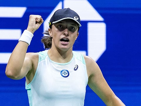 Poland's Iga Swiatek celebrates a point during her 2022 US Open quarter-final match against USA's Jessica Pegula.