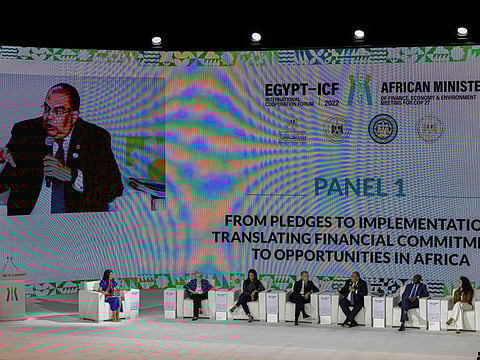 United Nation Special Envoy on Financing 2030 Agenda for Sustainable Development, Mahmoud Mohieldin of Egypt, is seen on screen as he talks during an African Ministers of Finance, Economy and Environment Meeting for the COP27 climate summit, in Al Masa hotel at the New Administrative Capital, some 45km east of Cairo, on September 7, 2022.  