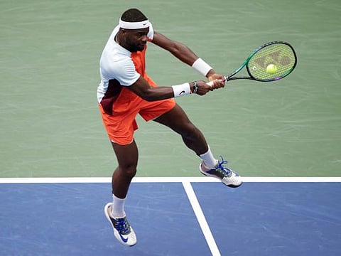 American Frances Tiafoe hits a return to Russia's Andrey Rublev during their 2022 US Open quarter-finals at the USTA Billie Jean King National Tennis Center in New York on Wednesday.
