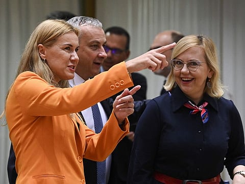 From left: EU commissioner for Energy Estonia's Kadri Simson talks to Minister of industry and trade of the Czech Republic Jozef Sikela and Poland's Minister of Climate and Environment Anna Moskwa  during a EU Energy ministers meeting to find solutions to rising energy prices at the EU headquarters in Brussels on September 9, 2022. 
