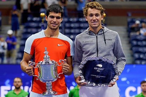 Carlos Alcaraz (left) and Casper Ruud pose for a photo after the men's singles final of the US Open tennis championships in New York.