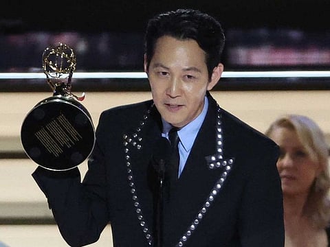 Lee Jung-jae accepts the award for Outstanding Lead Actor In A Drama Series for "Squid Game" at the 74th Primetime Emmy Awards held at the Microsoft Theater in Los Angeles, U.S., September 12, 2022. 