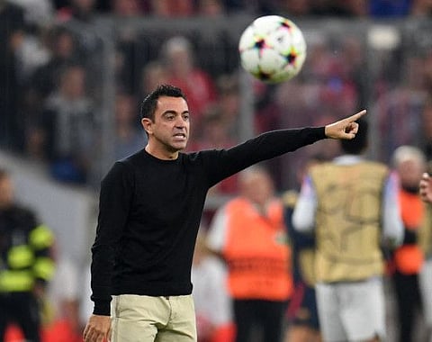 Barcelona coach Xavi reacts during the Champions League clash against Bayern Munich at the Allianz Arena, Munich.