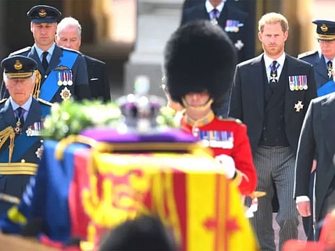  Britain's King Charles III, Britain's Prince William, Prince of Wales, Britain's Earl of Snowdon Britain's Prince Harry, Duke of Sussex and Britain's Prince Andrew, Duke of York walk behind the coffin of Queen Elizabeth II, adorned with a Royal Standard and the Imperial State Crown and pulled by a Gun Carriage of The King's Troop Royal Horse Artillery, during a procession from Buckingham Palace to the Palace of Westminster, in London.