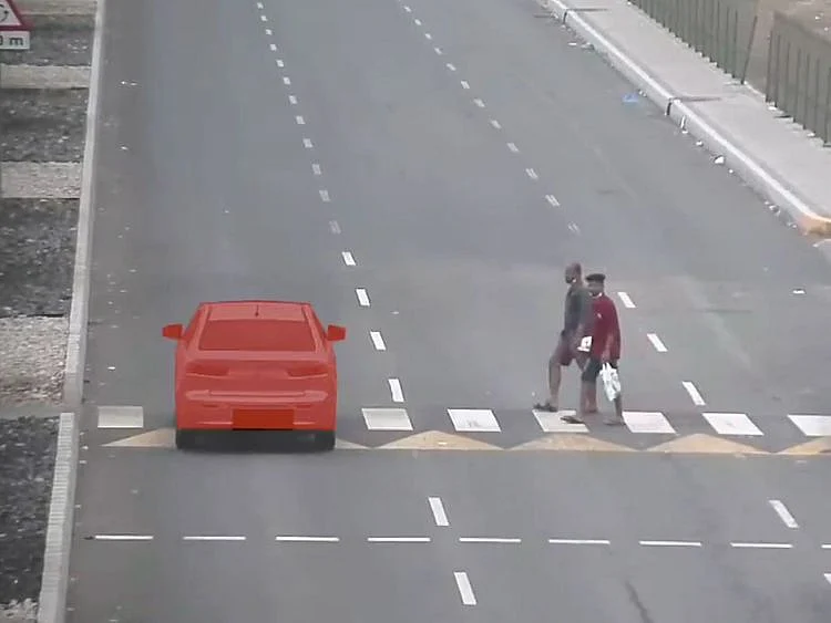 Screenshot-of-abu-dhabi-police-video-showing-car-not-stopping-for-pedestrians-1663138737539