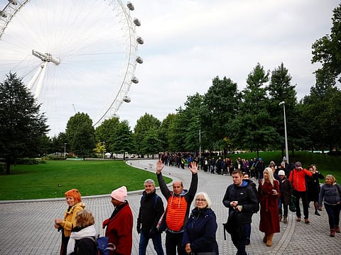 People queue to pay their respects following the death of Britain's Queen Elizabeth, in London on September 16, 2022. 