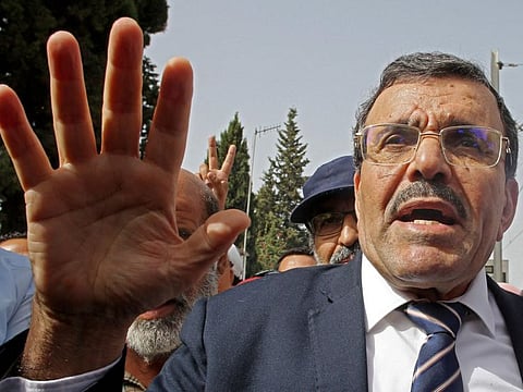 Ali Laarayadh, arrives at the office of Tunisia's counter-terrorism prosecutor in Tunis, on September 19, 2022.  