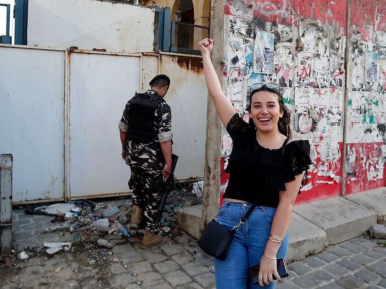 Sali Hafiz who is on the run in a file photo in Beirut during a demonstation.